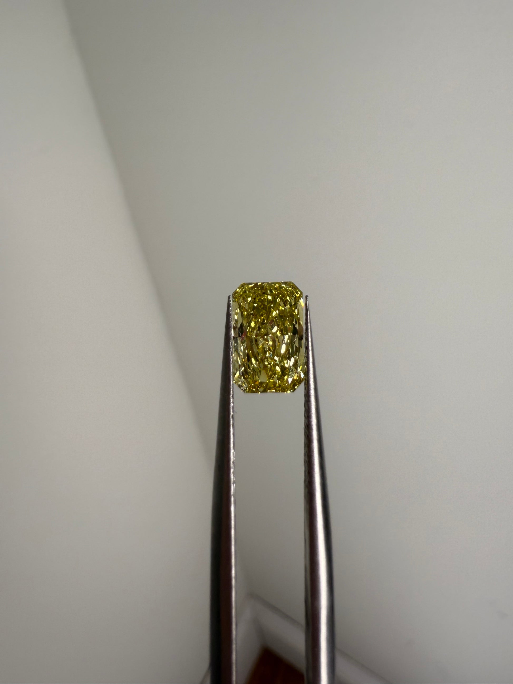 1.55ct VVS2 fancy canary yellow radiant diamond