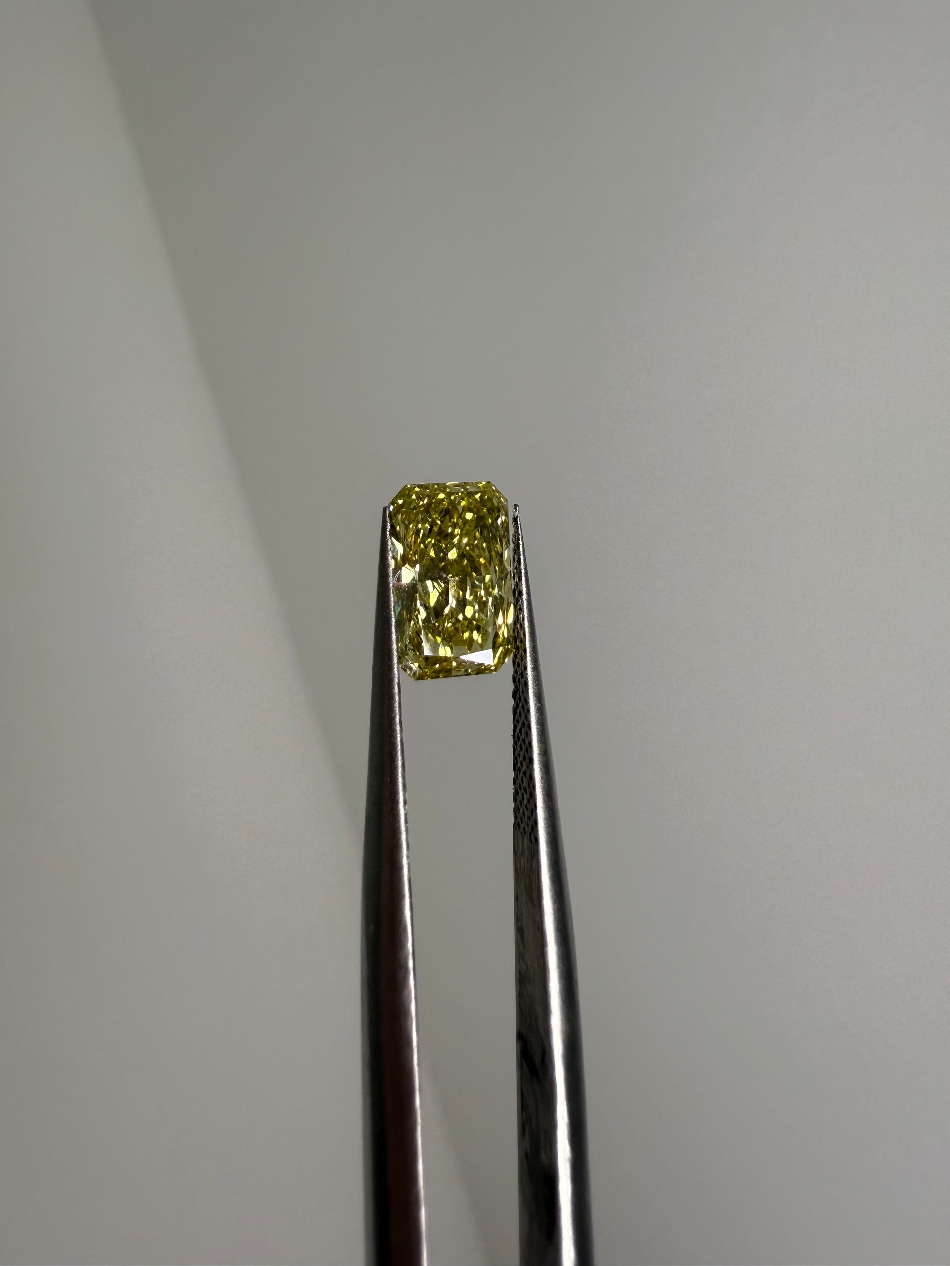 1.55ct VVS2 fancy canary yellow radiant diamond