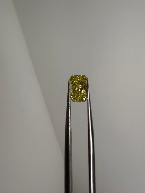 1.55ct VVS2 fancy canary yellow radiant diamond