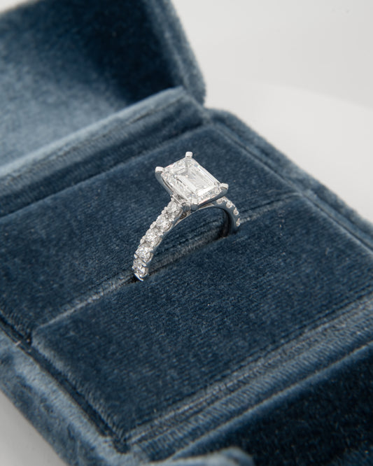 18kt 3ct emerald cut ring 1/2 pave