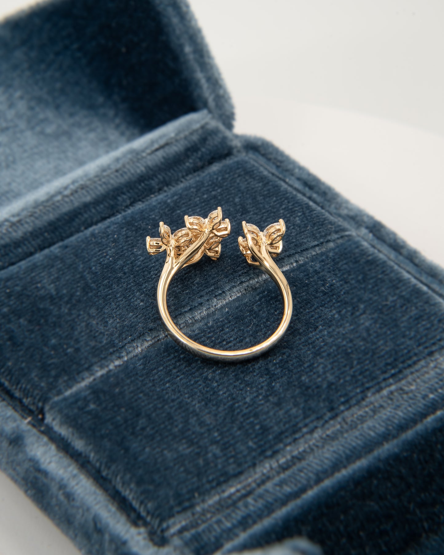 Agatha floral bypass diamond ring