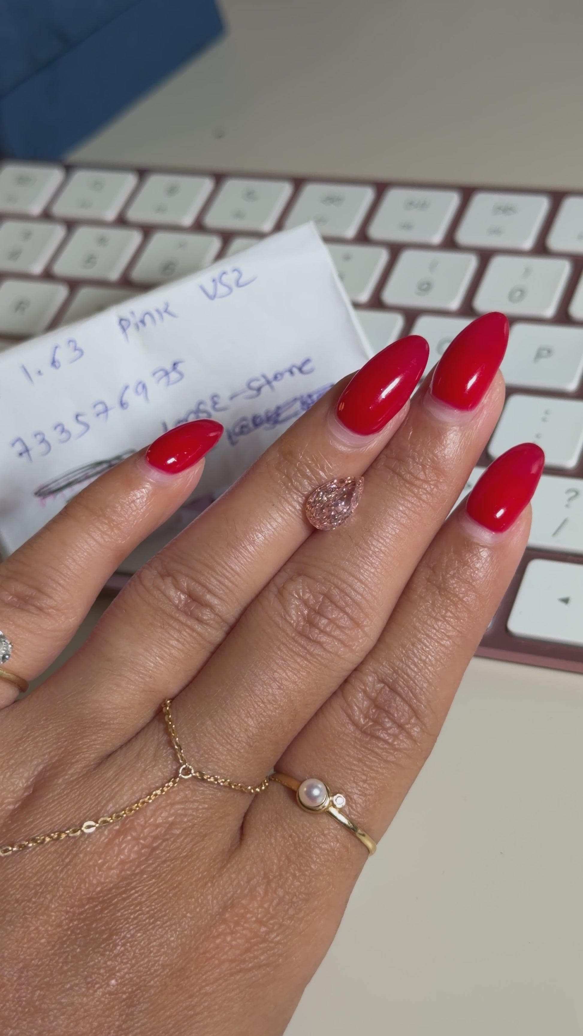 1.63ct fancy intense pink VS2 pear