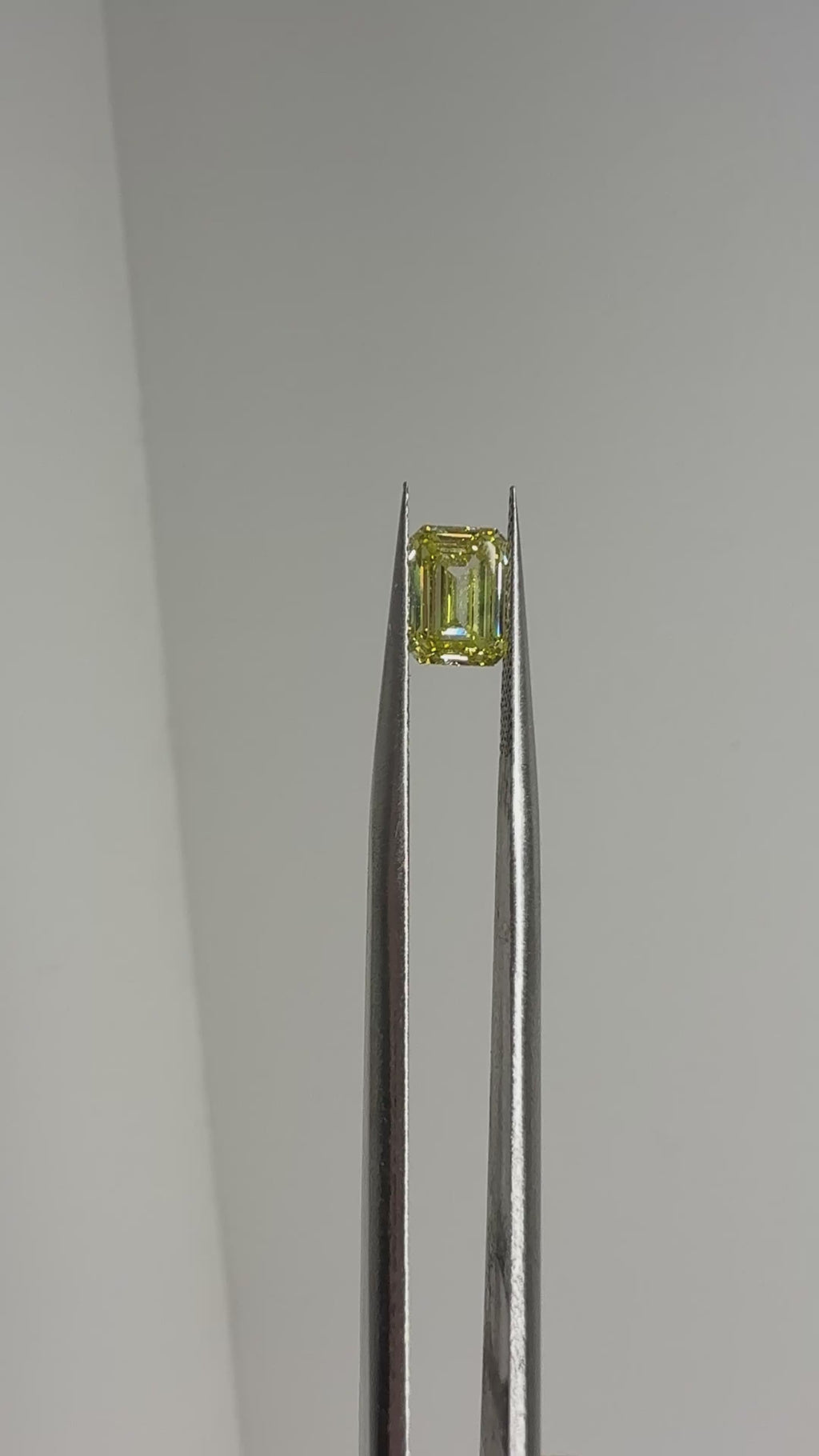 1.54 ct VVS2 fancy canary yellow emerald diamond